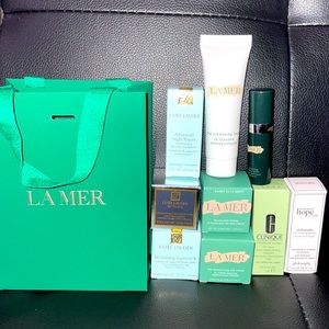 La Mer beauty sample size bundle. Includes other brand names shown as well. New